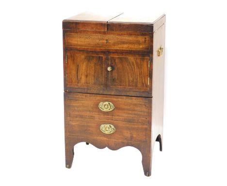 A George III mahogany bedside commode, the hinged lid raised above a cabinet and two drawers, on shaped legs, 81cm high, 6cm 