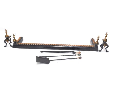 A late 19thC ebonised iron and copper fire curb or fender, with spirally turned decoration and turned finials, 146cm wide, a 