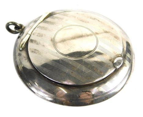 A George V silver powder compact, by D Bross, with mirror to the lid, part silver gilt interior, and part engine turned desig