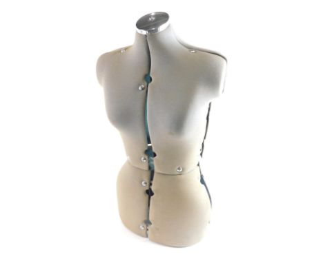 A modern mannequin torso, with chrome top and articulated body, 77cm high. 