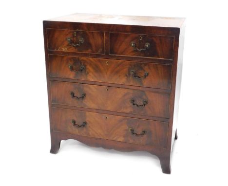 A mahogany chest of drawers, in the George III style, the caddy shaped top with a cross banded and ebony strung border, above