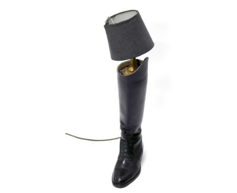 A hunting boot table lamp, with modern electrical fitting, 63cm high.