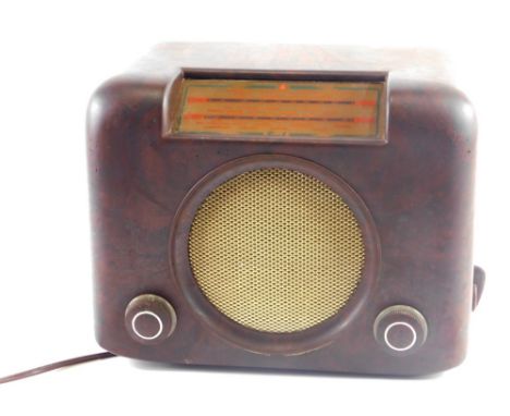 A vintage Bush radio DAC90A, in brown Bakelite case with front tuning knobs and speaker, 22cm high, 29cm wide, 16cm deep.