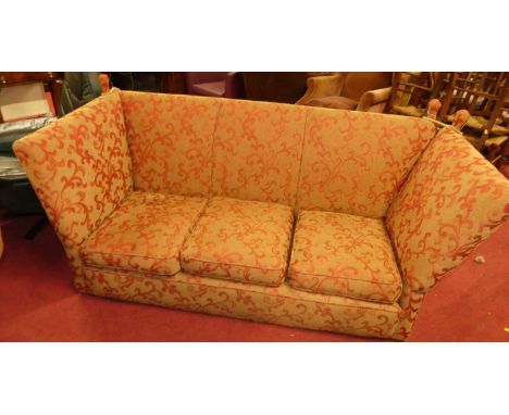 A red floral needlework upholstered three-seater Knoll sofa, having squab cushions, width 185cmSome wear to upholstery, most 