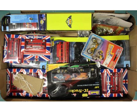 A tray containing a quantity of modern issue diecast to include various souvenir London buses, a Revell 1:87 scale IC-Mercede