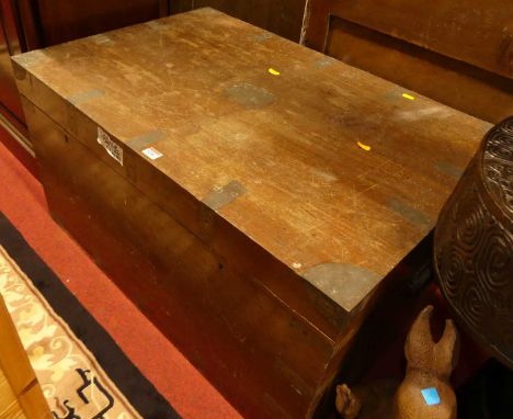 A circa 1900 camphor wood and brass bound military travelling trunk, having iron end carry handles and hinged cover, w.92cm 