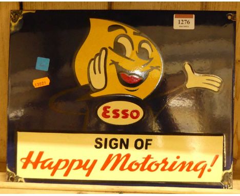 An enamel on metal wall mounted advertising sign titled ESSO Sign of Happy Motoring!, 26.5 x 34.5cm