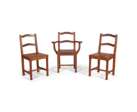 ALAN 'ACORNMAN' GRAINGER THREE CHAIRS, CIRCA 1960 oak with close-nailed later upholstery, carved acorn signature, comprising 