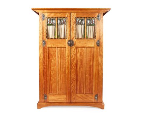 GEORGE HENRY WALTON (1867-1933) FOR ELMBANK, YORK WARDROBE, CIRCA 1920 satin birch, stained and leaded glass, with silvered m