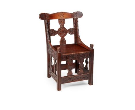 ENGLISH  'TYDAL' CHAIR, CIRCA 1900 carved oakDimensions:50cm wide, 96.5cm high, 49.5cm deepNote: Note: This chair is a direct