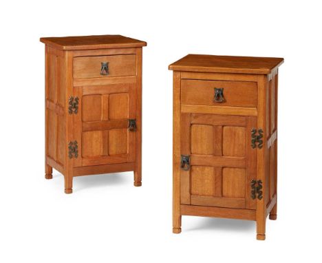 ALAN 'ACORNMAN' GRAINGER  PAIR OF BEDSIDE CABINETS, CIRCA 1960S/70S oak, with patinated steel fittings, each with carved acor