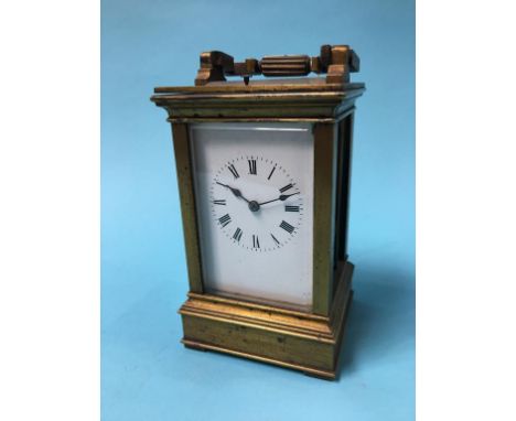 A brass chiming carriage clock, approx. 14.5cm tall