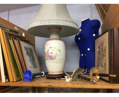 An Oriental lamp, a tailors dummy and prints