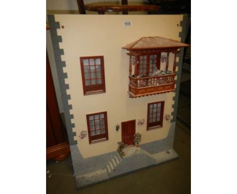 A doll house front panel.