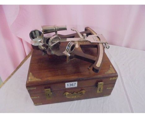 A good quality sextant in a mahogany box with brass fittings.