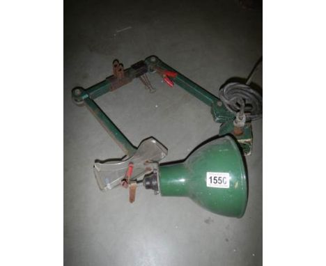 An adjustable metal work lamp.