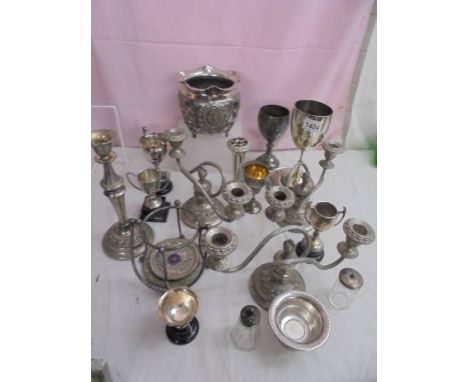 A mixed lot of silver plate including planter, candelabra, goblets etc.,