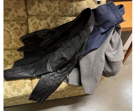 A blue suit, black leather jacket &amp; grey overcoat
