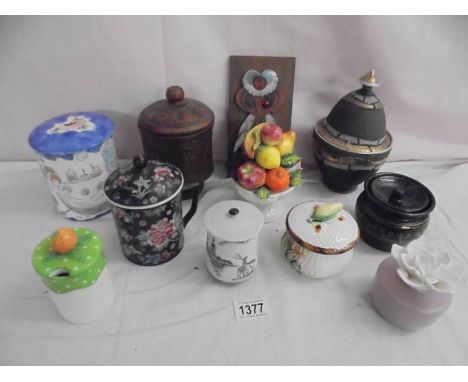 A collection of lidded pots including tobacco jar etc.,