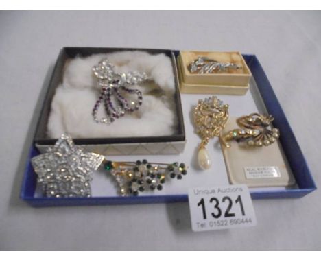 Six vintage fashion brooches.