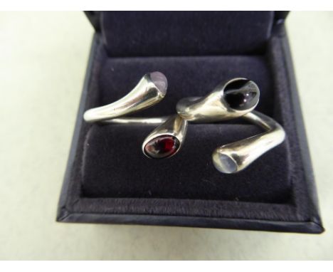 Pair of Georg Jensen Carnival silver rings, set with moonstone and onyx, rock crystal and garnet - design no. 263 - designed 