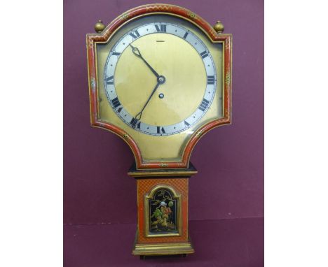 1920s red and black lacquered wall clock with brass dial, silvered chapter ring, Roman numerals, single key hole. English mov
