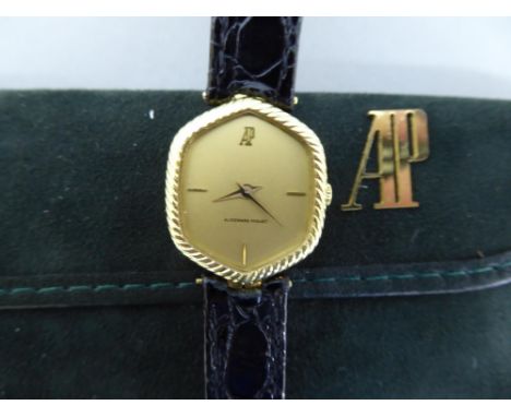 Audemars Piguet ladies' 18ct gold wrist watch No B27112 with black crocodile skin strap, suede case, original box and papers