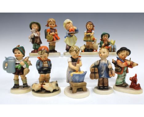 Shelf of Hummel / Goebel figures, tallest 13cm (10)