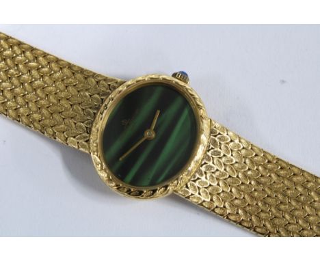 BAUME MERCIER, ladies 18ct gold wristwatch, with oval green dial, on a gold milanese bracelet strap, stamped 750, with cabouc