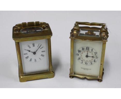 French brass and glass panelled carriage clock retailed by Sharman D.Neill Belfast, with floral painted face, 13cm, together 
