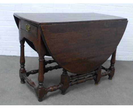 Oak gate leg table, with a drawer to one end, 154 x 74 x 116cm.