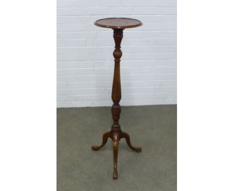 Mahogany torchere stand, leaf carved column and tripod legs, 31 x 110cm.