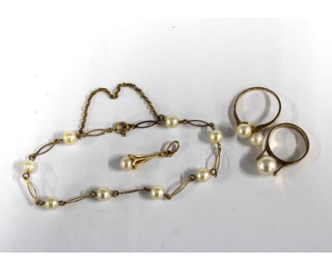 A vintage 9ct gold pearl ring, Edinburgh 1975 together with a 9ct gold pearl crossover dress ring, 9ct gold pearl drop pendan