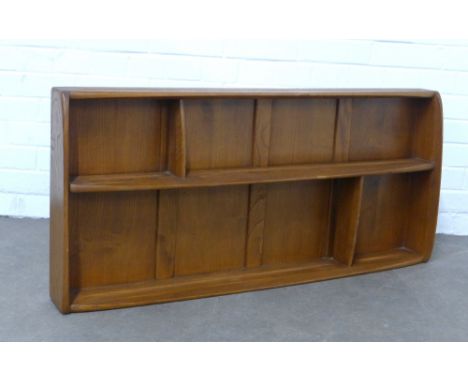 An Ercol elm plate rack, 107 x 50cm.