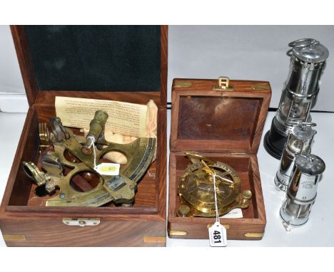 A CASED NAUTICALIA REPRODUCTION BRASS SEXTANT, A CASED REPRODUCTION OF A DESKTOP SUNDIAL AND THREE SMALL CHROME PLATED MINERS