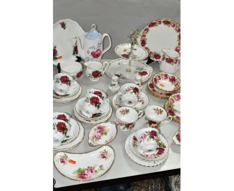 A COLLECTION OF ROYAL ALBERT ROSE PATTERNED TEA WARES, comprising twelve pieces of Old English Rose: a cake plate, a milk jug