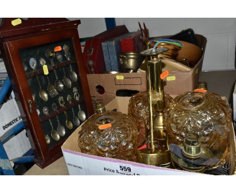 TWO BOXES OF METALWARE, to include packaged and unused Tetley Tea spoons, a brass ceiling light fitting with three amber glas