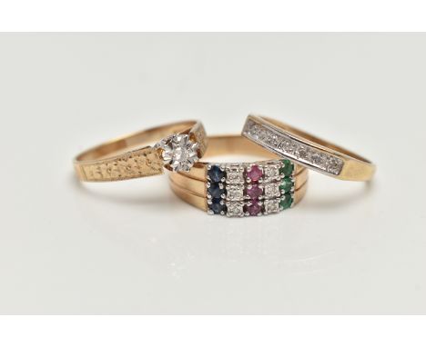 THREE 9CT GOLD GEM SET RINGS, the first a three row band ring, prong set with diamonds, sapphires, rubies and emeralds, hallm