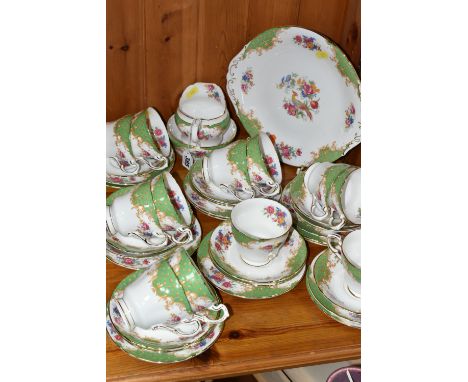 A PARAGON 'ROCKINGHAM' PATTERN TEA SET, comprising a cake plate, milk jug, twelve cups, twelve saucers, twelve tea plates (39