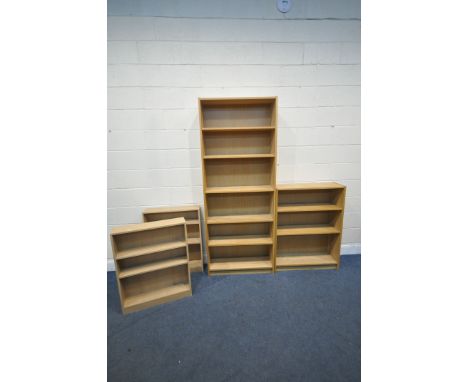 A LIGHT OAK OPEN BOOKCASE, width 80cm x depth 28cm x height 202cm, a matching smaller open bookcase, and two small open bookc