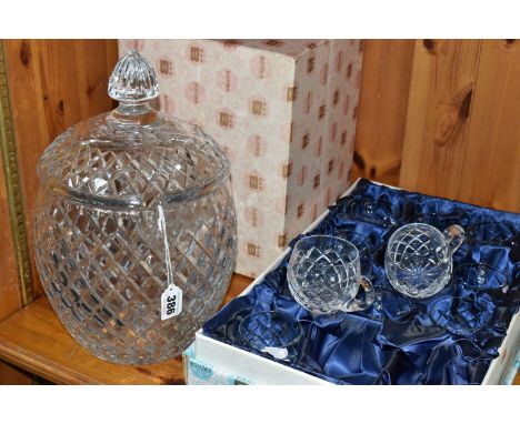 A BOXED BOHEMIA CRYSTAL PUNCH SET, comprising twelve boxed cups, cut crisscross pattern, together with a large covered punch 