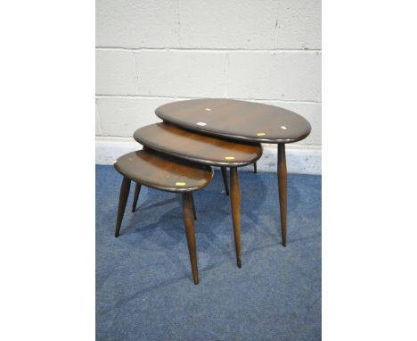 A MID CENTURY ERCOL PEBBLE NEST OF THREE TABLES, width 66cm x depth 44cm x height 40cm (condition report: all tables, with sc