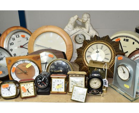A LARGE QUANTITY OF MID-CENTURY CLOCKS, comprising twenty five clocks and two barometers, five wall clocks, a Smiths gilt fra