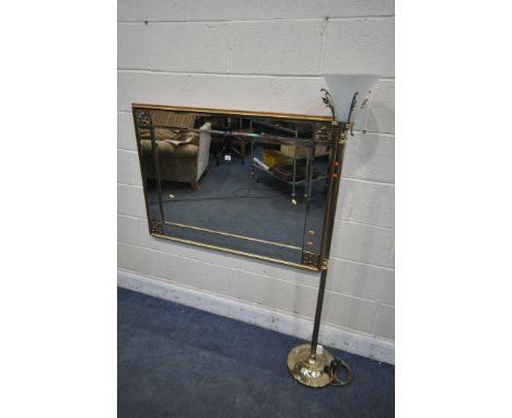 A MODERN GILT FRAMED BEVELLED EDGE WALL MIRROR, 115cm x 84cm, and a brass standard lamp, with a frosted glass shade (conditio