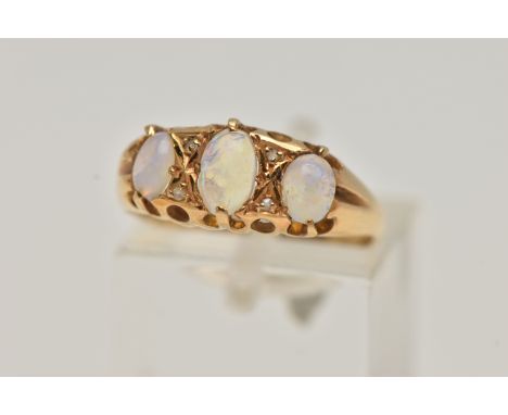 AN EARLY 20TH CENTURY 18CT GOLD OPAL RING, three oval opals prong set with four rose cut diamond accents, leading on to taper