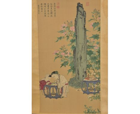 A Chinese embroidery on paper in scroll of girl and boy in garden. Size of paper 53.5cm x 30cm