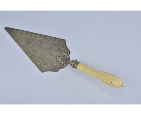 An English antique presentation trowel dated 7th November 1888. Length 31cm