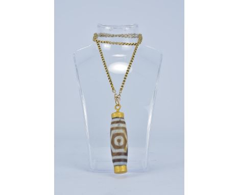 A Tianzhu style bead with 14K Gold Chain. 8cm