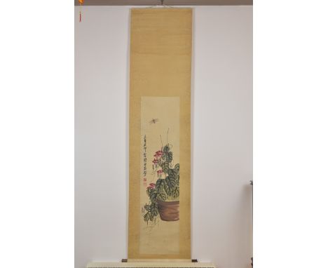 A Chinese watercolour painting in scroll of dragonfly and flower pot. Signed Qi Baishi. Painting 131.5cm x 33cm