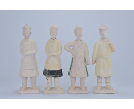 Four Chinese Ming Dynasty Pottery Tomb Figures. 28cm tall. Removeable heads Slight damage to one head. (4)&nbsp;Provenance:&n